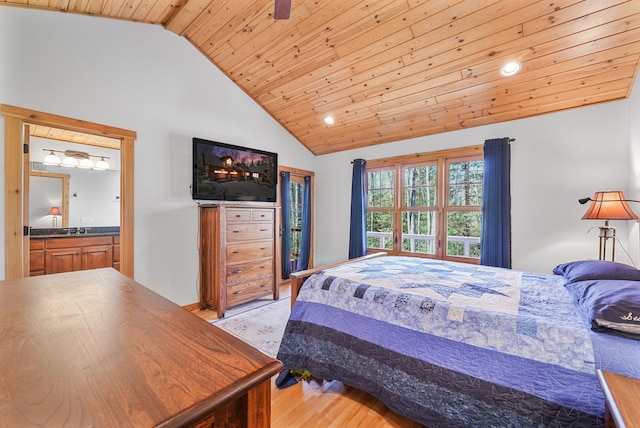 3958 Northshore Trl, Kewadin, MI 49648 - bedroom with light wood-style flooring, wooden ceiling, recessed lighting, a sink, and high vaulted ceiling