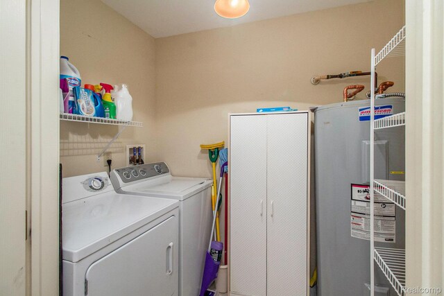15200 Silver Pkwy Unit 101, Fenton, MI 48430 - laundry area with electric water heater and separate washer and dryer