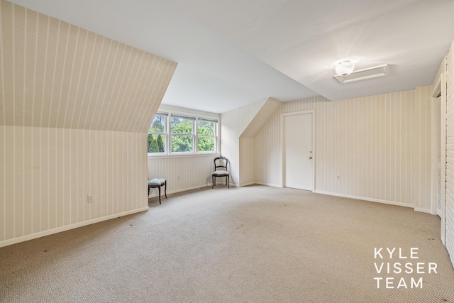 600 Plymouth Ave SE, East Grand Rapids, MI 49506 - bonus room featuring carpet floors and lofted ceiling