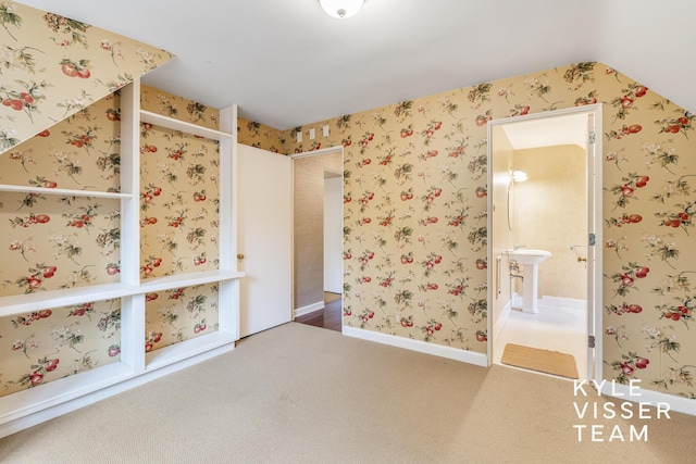 600 Plymouth Ave SE, East Grand Rapids, MI 49506 - unfurnished bedroom featuring carpet, ensuite bath, and a sink