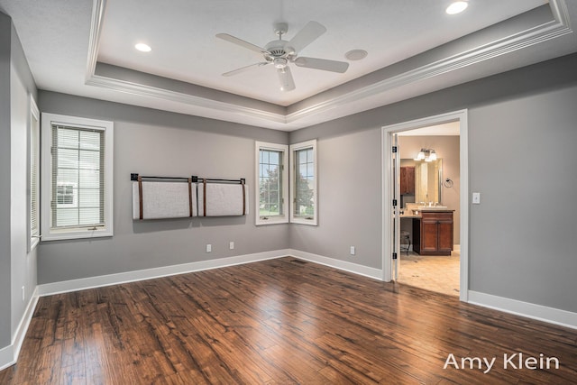 1657 N Bay Dr, Hudsonville, MI 49426 - unfurnished room with a tray ceiling, healthy amount of natural light, hardwood / wood-style flooring, and recessed lighting