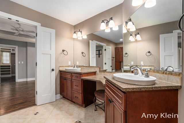 1657 N Bay Dr, Hudsonville, MI 49426 - full bathroom featuring vanity, tile patterned floors, and baseboards
