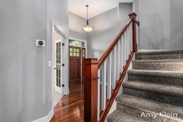 1657 N Bay Dr, Hudsonville, MI 49426 - entrance foyer featuring wood finished floors, stairway, and baseboards
