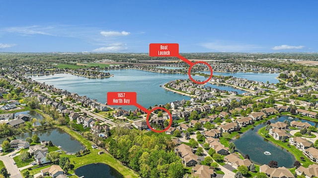 1657 N Bay Dr, Hudsonville, MI 49426 - aerial view of property's location with nearby suburban area and a nearby body of water