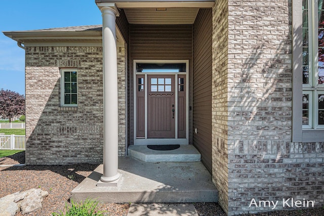 1657 N Bay Dr, Hudsonville, MI 49426 - view of exterior entry featuring brick siding