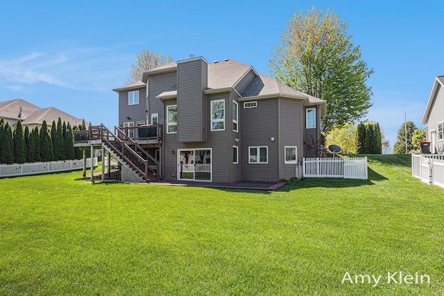 1657 N Bay Dr, Hudsonville, MI 49426 - back of house featuring a deck, stairway, and a chimney
