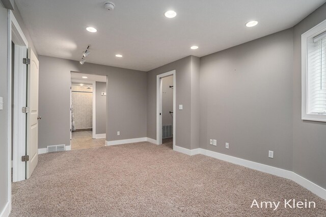 1657 N Bay Dr, Hudsonville, MI 49426 - spare room with light colored carpet, a smoke detector, recessed lighting, and baseboards