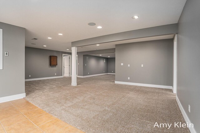 1657 N Bay Dr, Hudsonville, MI 49426 - finished below grade area featuring light colored carpet, recessed lighting, baseboards, and light tile patterned floors