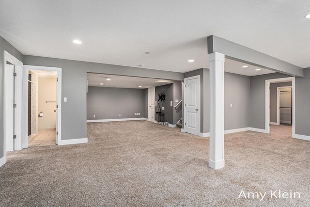 1657 N Bay Dr, Hudsonville, MI 49426 - finished basement with light colored carpet, recessed lighting, baseboards, and stairway