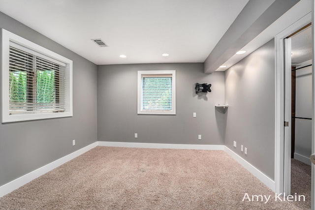 1657 N Bay Dr, Hudsonville, MI 49426 - spare room with carpet, recessed lighting, and baseboards