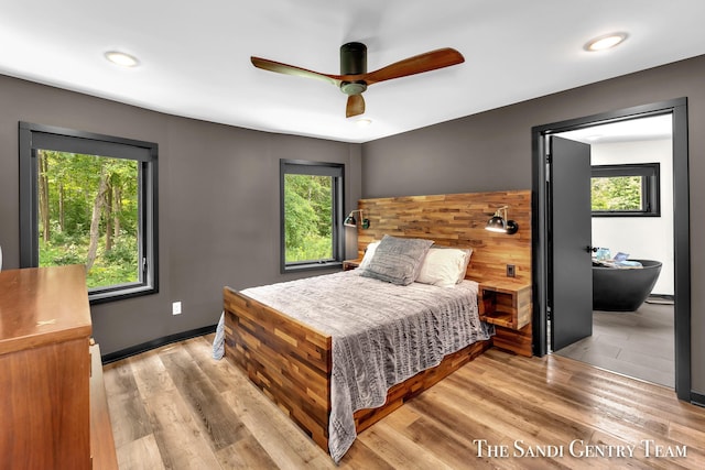 18619 130th Ave, Fruitport, MI 49415 - bedroom with light wood-style floors, a ceiling fan, and recessed lighting