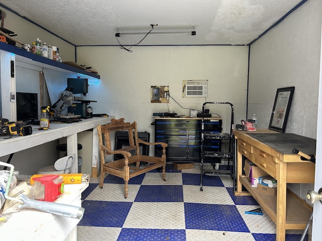 3092 S M 37, Baldwin, MI 49304 - garage with a workshop area, an AC wall unit, and electric panel