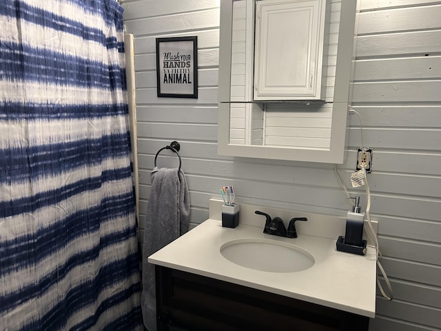 3092 S M 37, Baldwin, MI 49304 - bathroom with vanity and wood walls