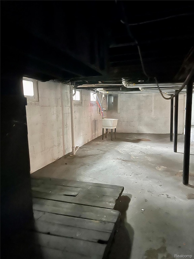 8887 Sorrento St, Detroit, MI 48228 - basement with plenty of natural light and a sink