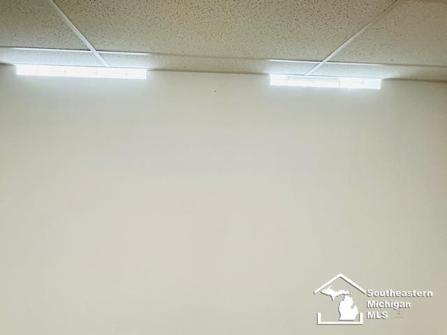 8499 Armstrong Rd, Newport, MI 48166 - below grade area with a drop ceiling