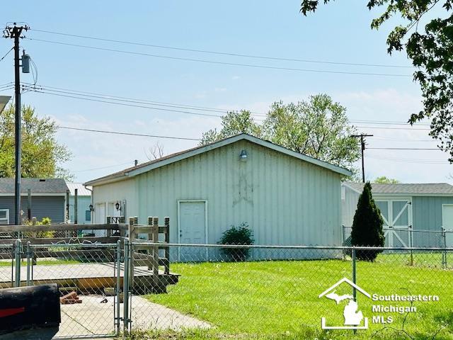 8499 Armstrong Rd, Newport, MI 48166 - view of outdoor structure with a gate