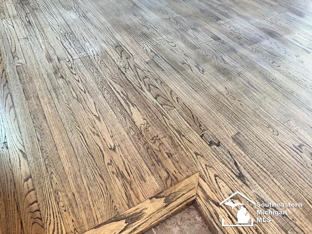 8499 Armstrong Rd, Newport, MI 48166 - detailed view of wood finished floors
