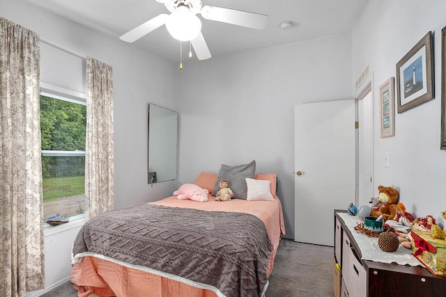 11478 E 7 Mile Rd, Tustin, MI 49688 - bedroom with carpet and ceiling fan