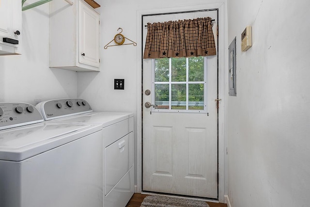 11478 E 7 Mile Rd, Tustin, MI 49688 - washroom featuring cabinet space, washing machine and dryer, and dark wood-style flooring