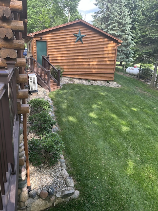 14278 Tyson Trl, Camden, MI 49232 - view of side of home featuring a lawn