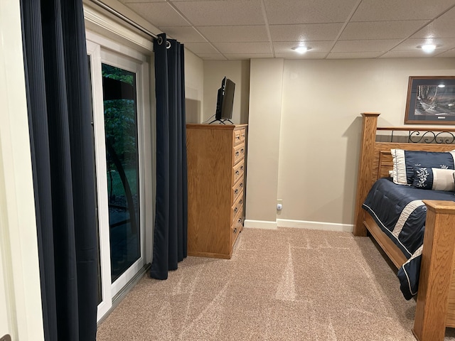14278 Tyson Trl, Camden, MI 49232 - bedroom featuring carpet floors, a paneled ceiling, and baseboards