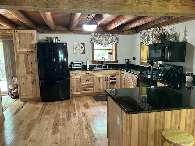 14278 Tyson Trl, Camden, MI 49232 - kitchen with black appliances, a sink, wood ceiling with exposed beams, light wood-type flooring, and a peninsula