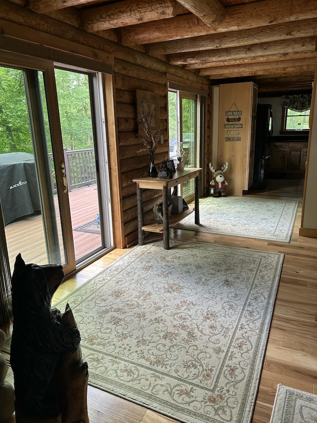 14278 Tyson Trl, Camden, MI 49232 - office space featuring wood finished floors, beamed ceiling, and log walls