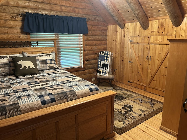 14278 Tyson Trl, Camden, MI 49232 - bedroom featuring log walls, wooden ceiling, and hardwood / wood-style floors