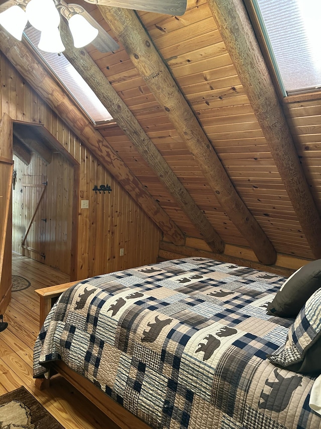14278 Tyson Trl, Camden, MI 49232 - bedroom with hardwood / wood-style flooring, wooden ceiling, and wooden walls