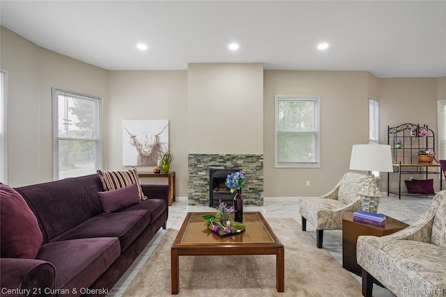 65 Melbourne St, Detroit, MI 48202 - living room with healthy amount of natural light, recessed lighting, and a stone fireplace