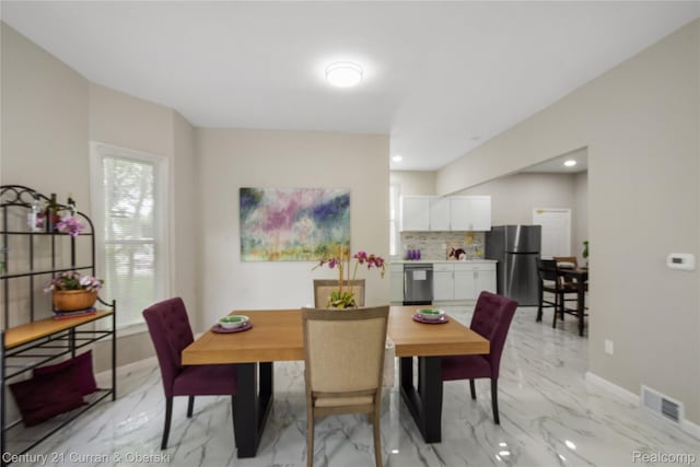 65 Melbourne St, Detroit, MI 48202 - dining room with light marble finish floors and baseboards