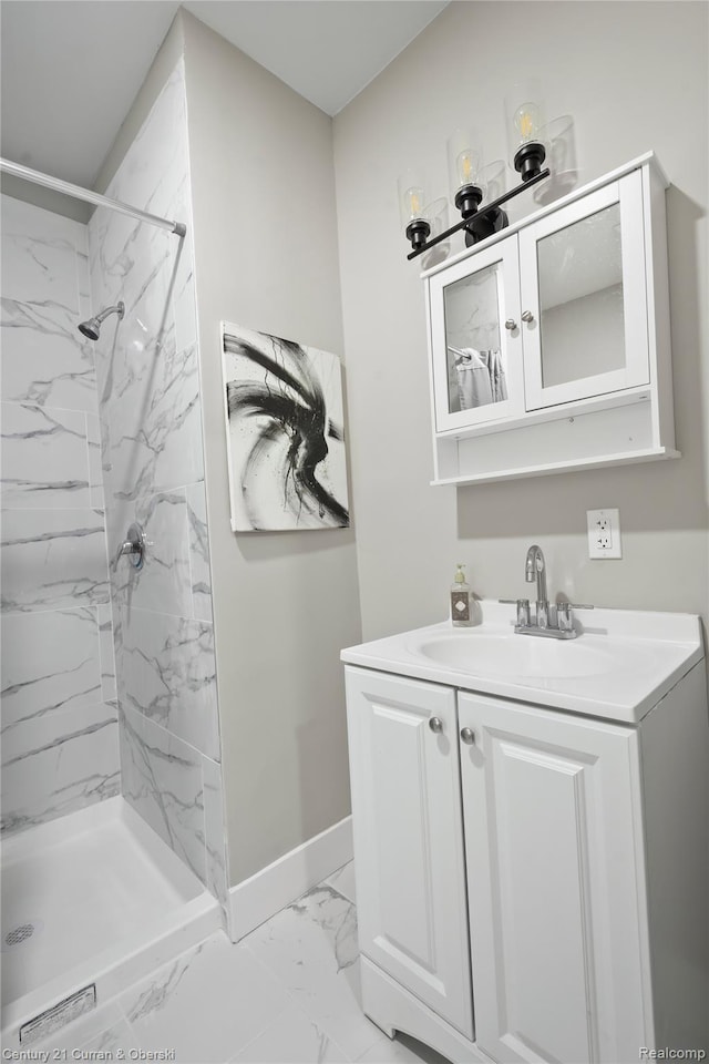 65 Melbourne St, Detroit, MI 48202 - full bath featuring marble finish flooring, a marble finish shower, vanity, and baseboards