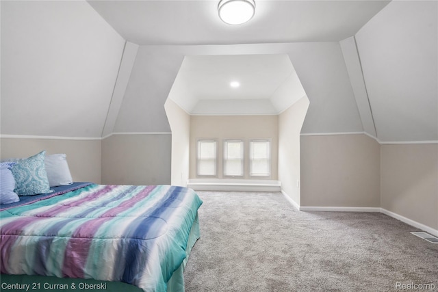 65 Melbourne St, Detroit, MI 48202 - carpeted bedroom featuring lofted ceiling and baseboards