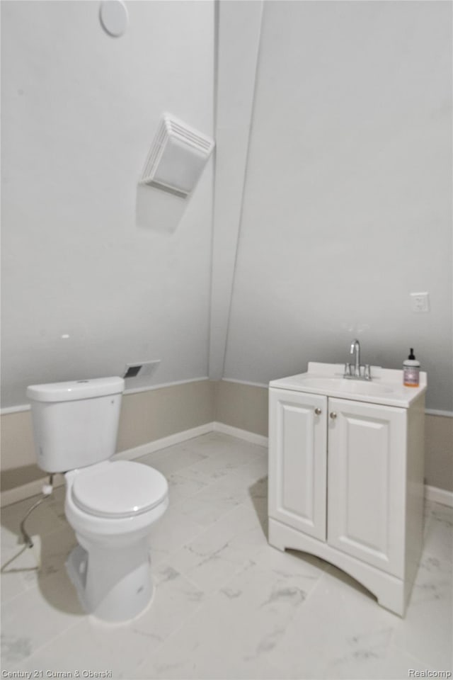 65 Melbourne St, Detroit, MI 48202 - half bath with toilet, marble finish floors, baseboards, and vanity