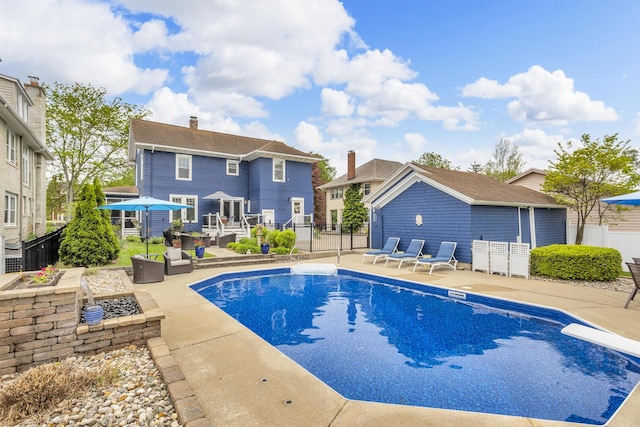 1406 W Washington Ave, Jackson, MI 49203 - view of pool featuring a patio and a diving board