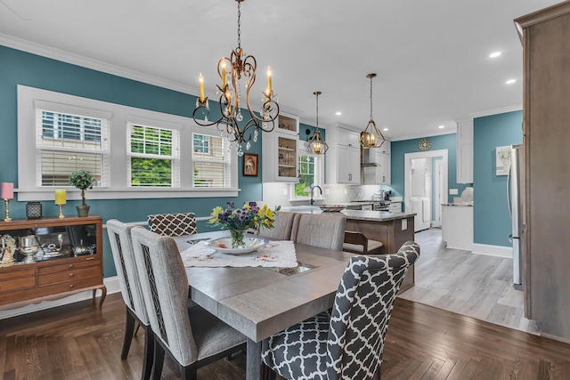 1406 W Washington Ave, Jackson, MI 49203 - dining space with crown molding, a chandelier, baseboards, plenty of natural light, and recessed lighting