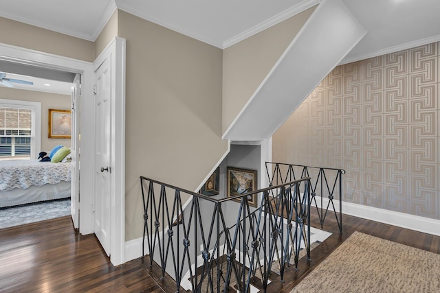 1406 W Washington Ave, Jackson, MI 49203 - stairs with hardwood / wood-style flooring, baseboards, a ceiling fan, and ornamental molding