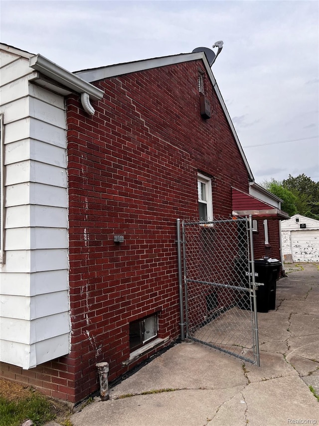 8208 Kentucky St, Detroit, MI 48204 - view of property exterior featuring a gate