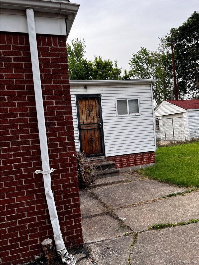 8208 Kentucky St, Detroit, MI 48204 - property entrance with brick siding