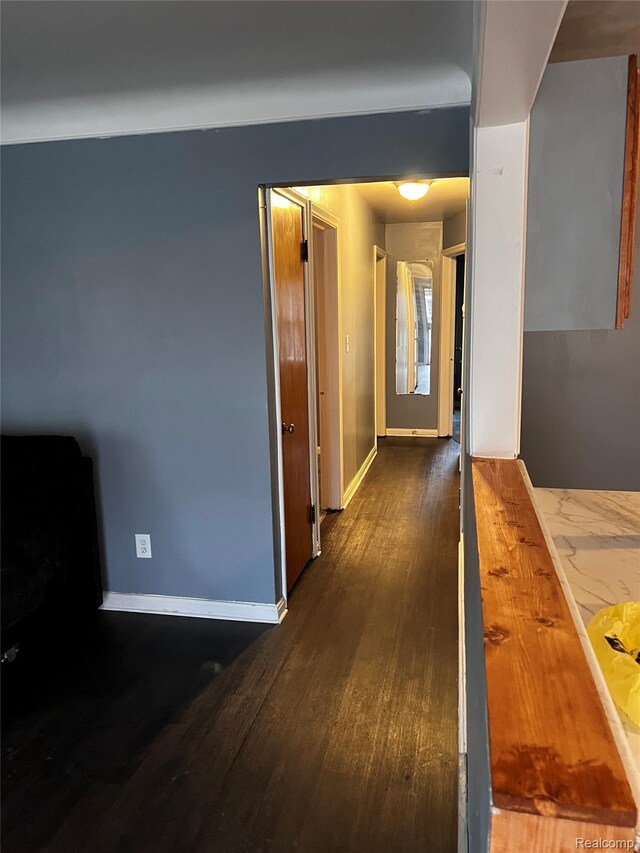 8208 Kentucky St, Detroit, MI 48204 - hall featuring dark wood-style flooring