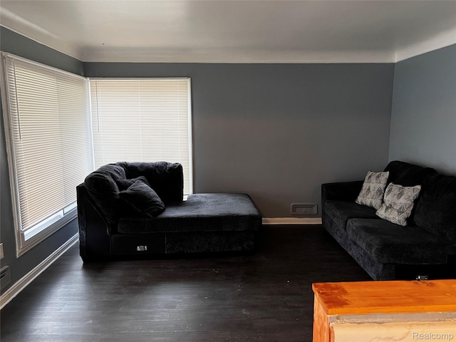 8208 Kentucky St, Detroit, MI 48204 - living room with dark wood finished floors and baseboards