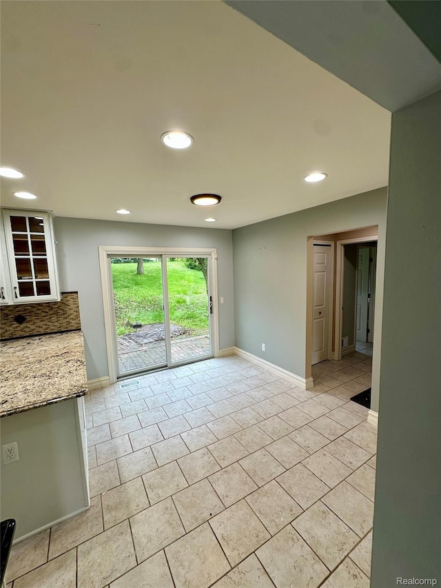 3758 Tienken Rd, Auburn Hills, MI 48326 - unfurnished living room featuring recessed lighting, baseboards, and light tile patterned floors
