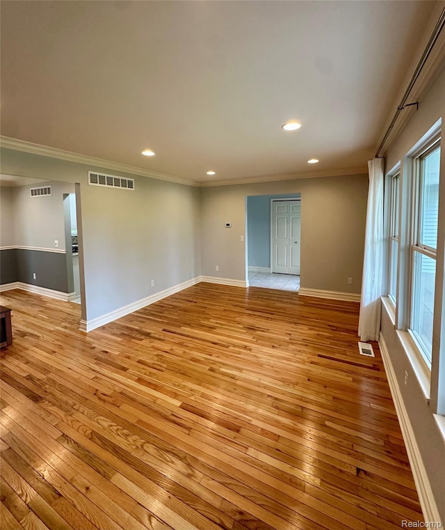 3758 Tienken Rd, Auburn Hills, MI 48326 - empty room featuring light wood-type flooring, ornamental molding, recessed lighting, and baseboards