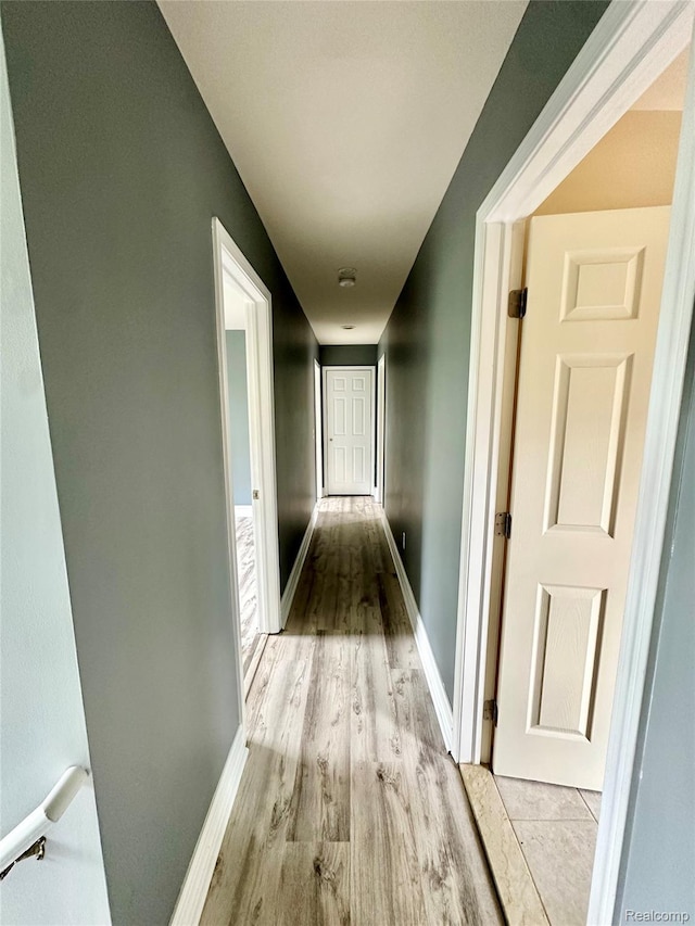 3758 Tienken Rd, Auburn Hills, MI 48326 - hallway with light wood finished floors and baseboards