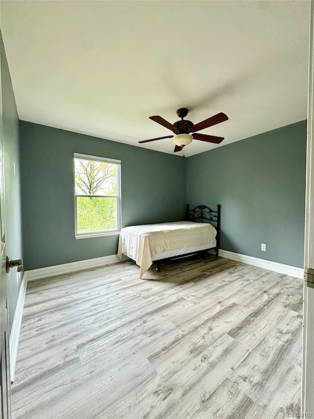 3758 Tienken Rd, Auburn Hills, MI 48326 - bedroom featuring wood finished floors, baseboards, and ceiling fan