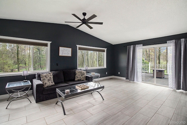 5315 Brown Rd, Millington, MI 48746 - living room with ceiling fan, vaulted ceiling, and baseboards