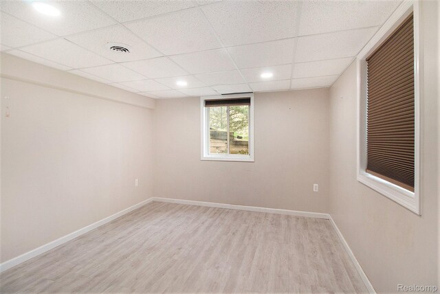 5315 Brown Rd, Millington, MI 48746 - spare room featuring light wood-type flooring, a paneled ceiling, baseboards, and recessed lighting