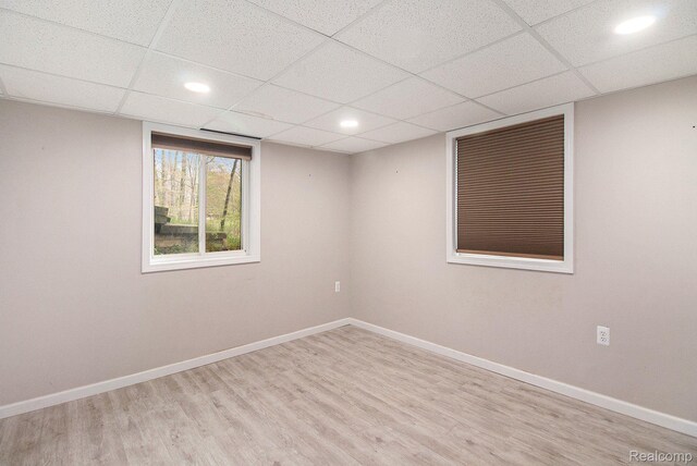 5315 Brown Rd, Millington, MI 48746 - unfurnished room with wood finished floors, recessed lighting, baseboards, and a drop ceiling
