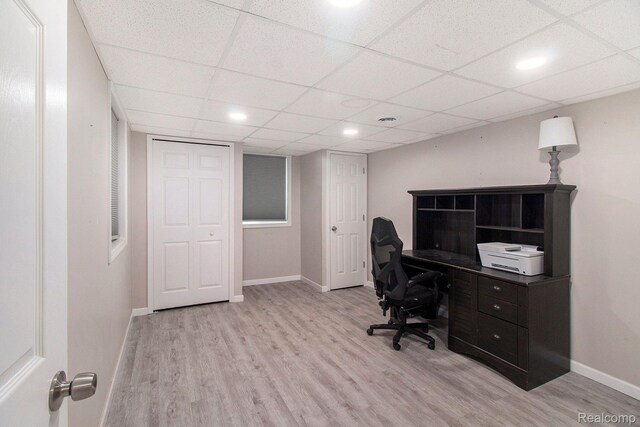 5315 Brown Rd, Millington, MI 48746 - office area with wood finished floors, baseboards, and a paneled ceiling