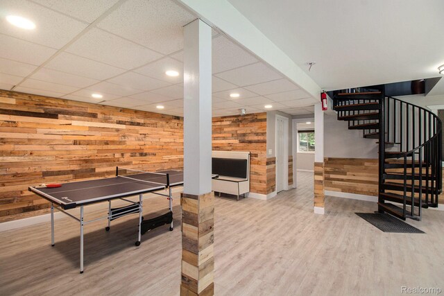 5315 Brown Rd, Millington, MI 48746 - game room with wooden walls, wood finished floors, baseboards, recessed lighting, and a drop ceiling